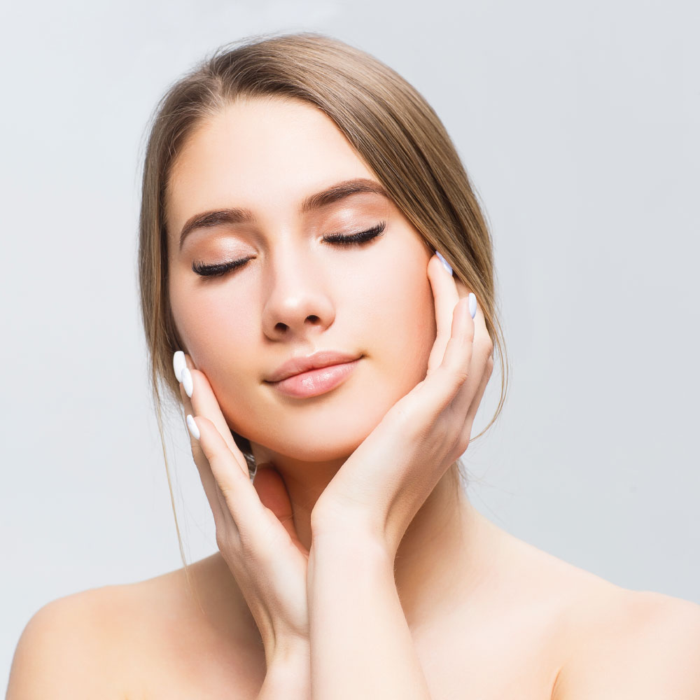 Beautiful face of young woman with clean fresh skin | Aesthetics Beauty Boutique | Miami Florida